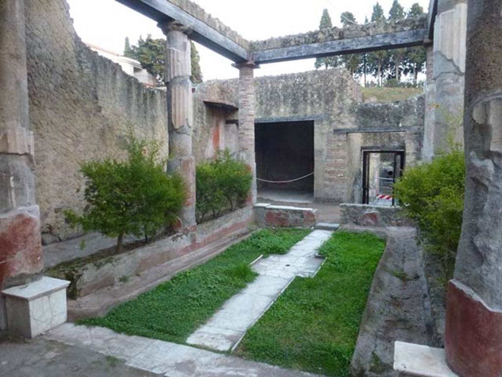 V.30 Herculaneum, October 2012. Looking east across atrium towards the oecus and entrance doorway. Photo courtesy of Michael Binns.